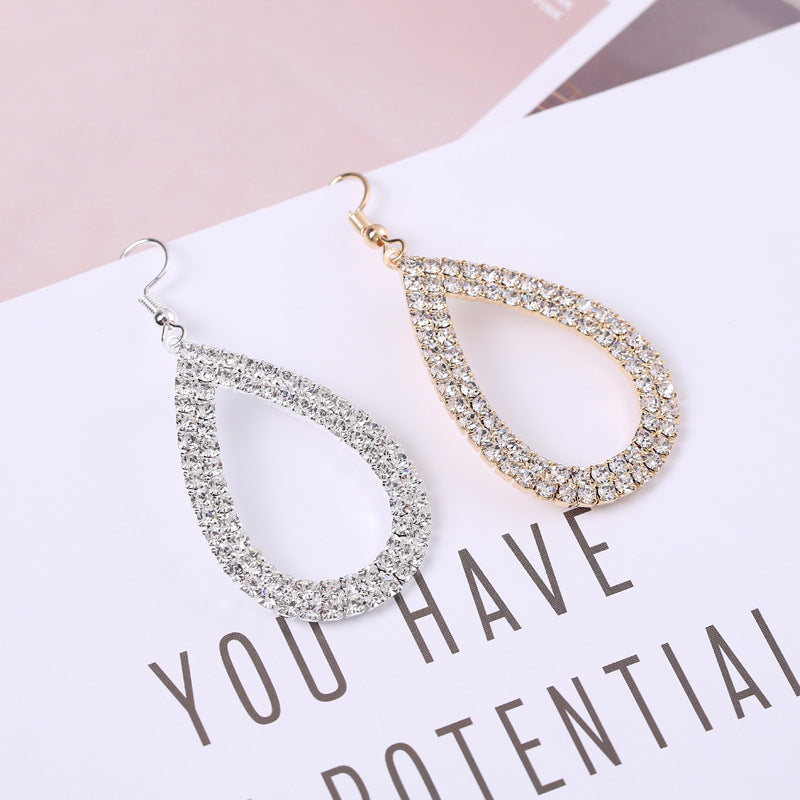 Women's Eye-catching Hollow Single Water Drop Metal Alloy Earrings