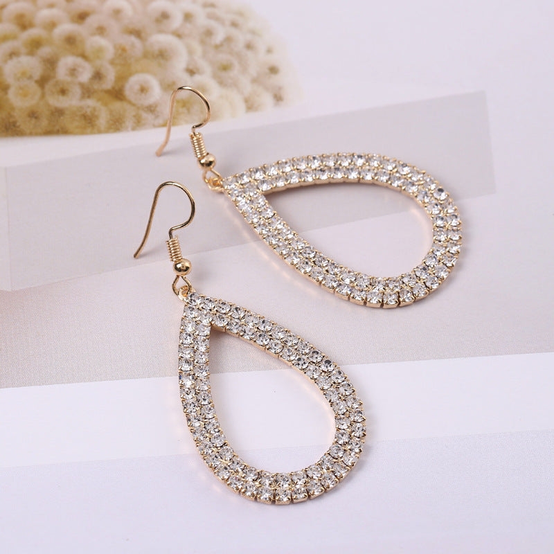 Women's Eye-catching Hollow Single Water Drop Metal Alloy Earrings