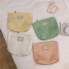 Fresh Solid Color Little Flower Women's Handbags displayed in various pastel colors including yellow, green, white, and pink.